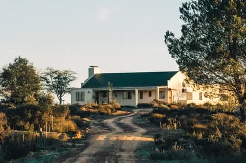 The Garsland Cottage in the early morning, at the end of the farm track
